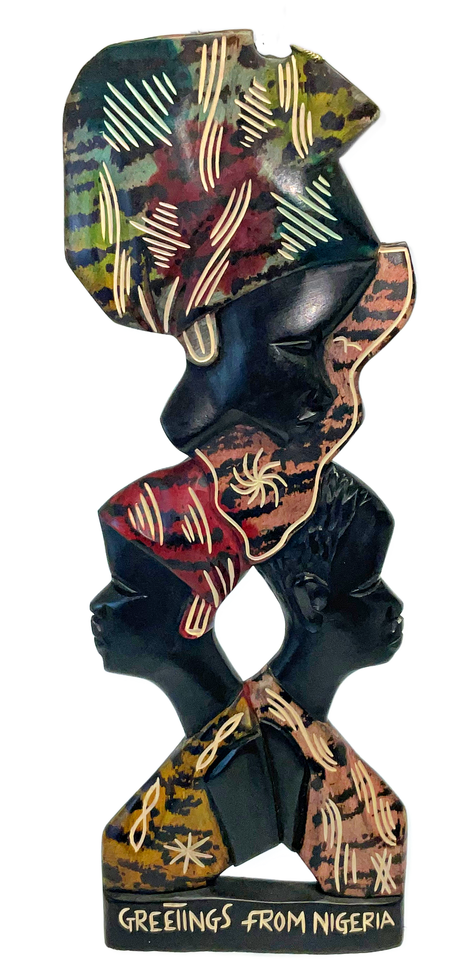 A Nigerian carved wall Art called - African Unity