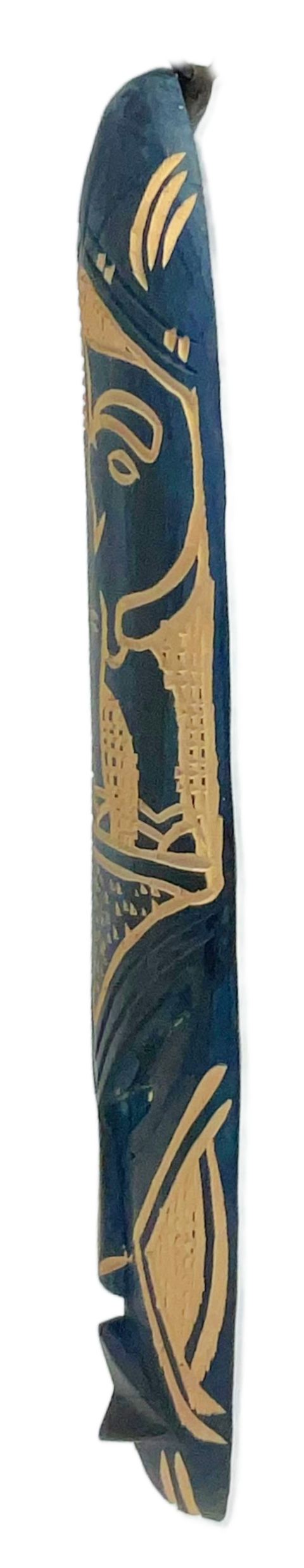 Side view of a Nigerian Hand carved Sculpture called - The Elephant.