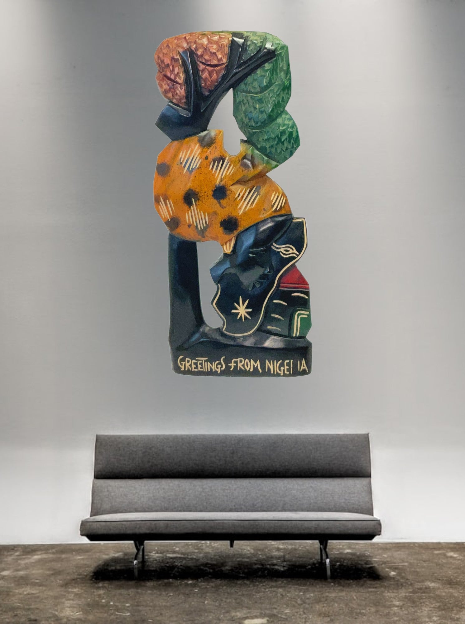 'Mother Africa' Wood Wall Art hung on a wall