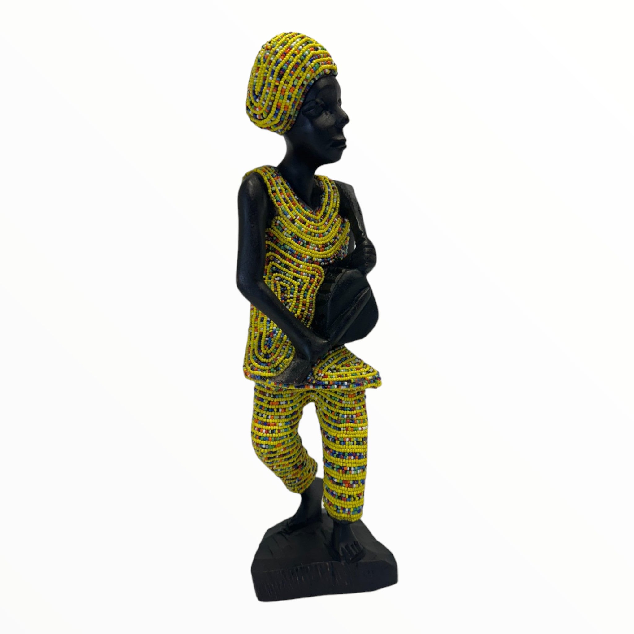 Front view of a Male drummer sculpture in a Yellow attire