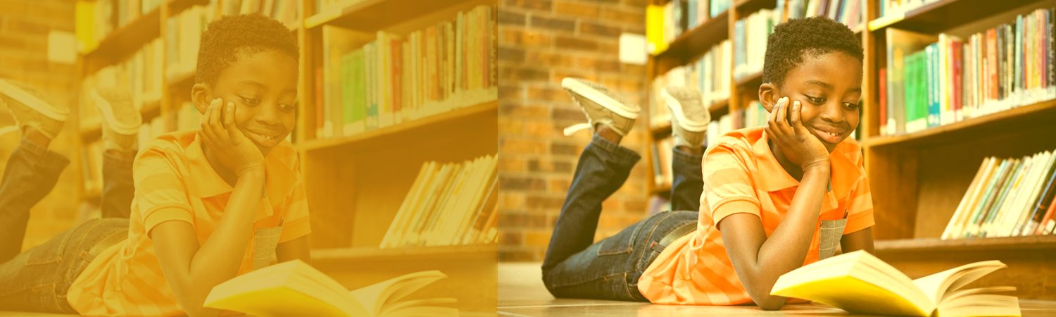 A Nigerian child reading a book in the library