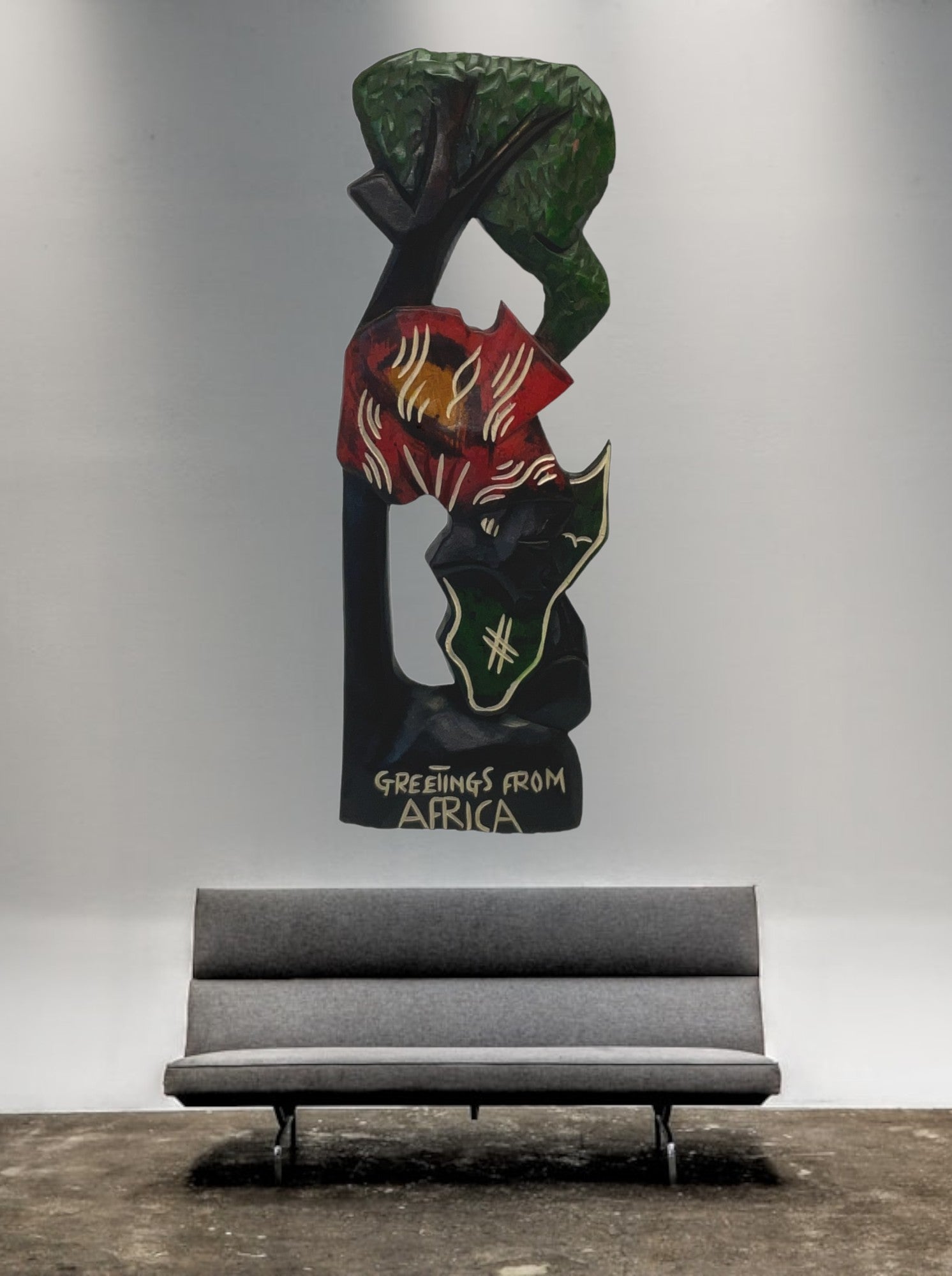 Greetings from Africa 'Mother Africa' Wooden Wall Art hung on a wall